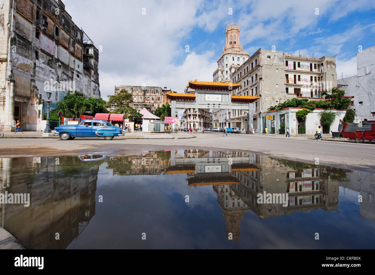 1950s classic American car in Chinatown reflecting in water, Central Havana, Cuba, West Indies, Caribbean, Central America Stock Photo