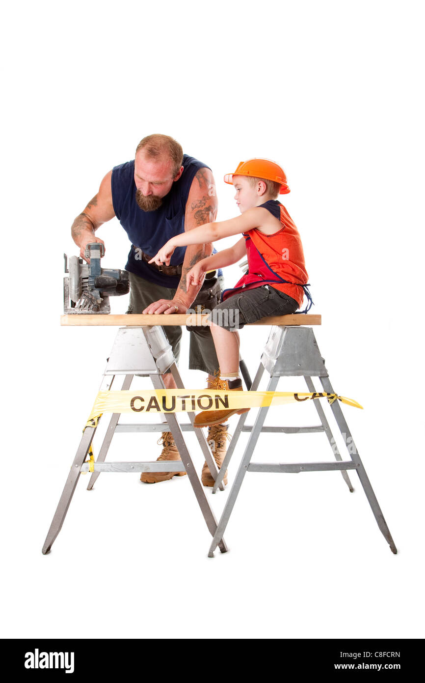 Dad with son and circle saw Stock Photo