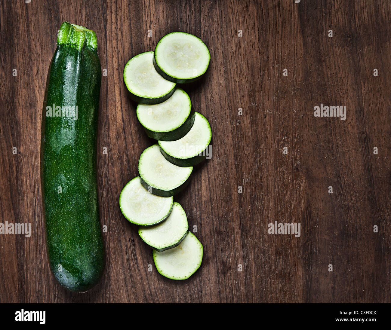 Chopped Courgette on Chopping Board Stock Photo