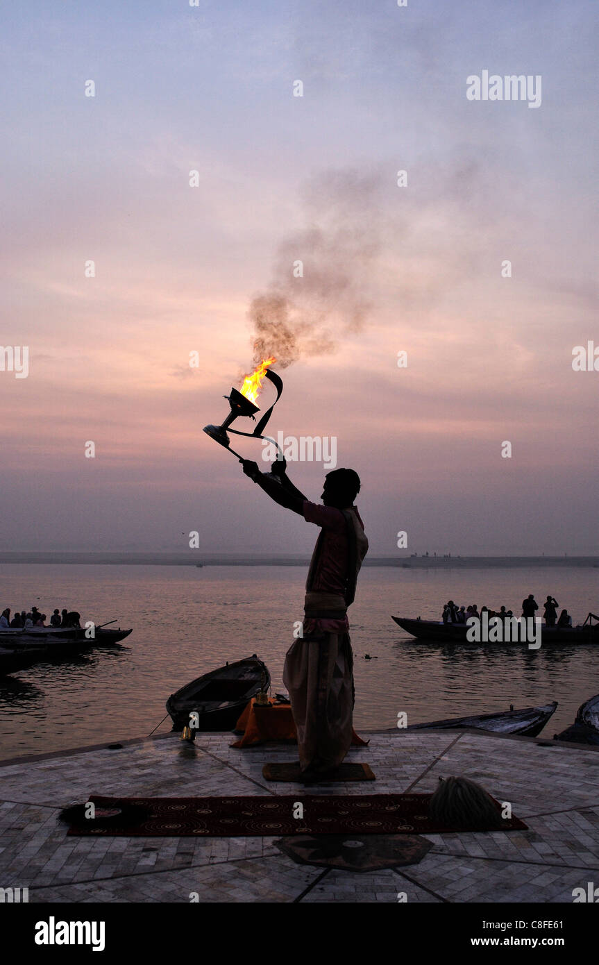Sunrise ritual at the River Ganges, Varanasi (Benares, Uttar Pradesh, India Stock Photo