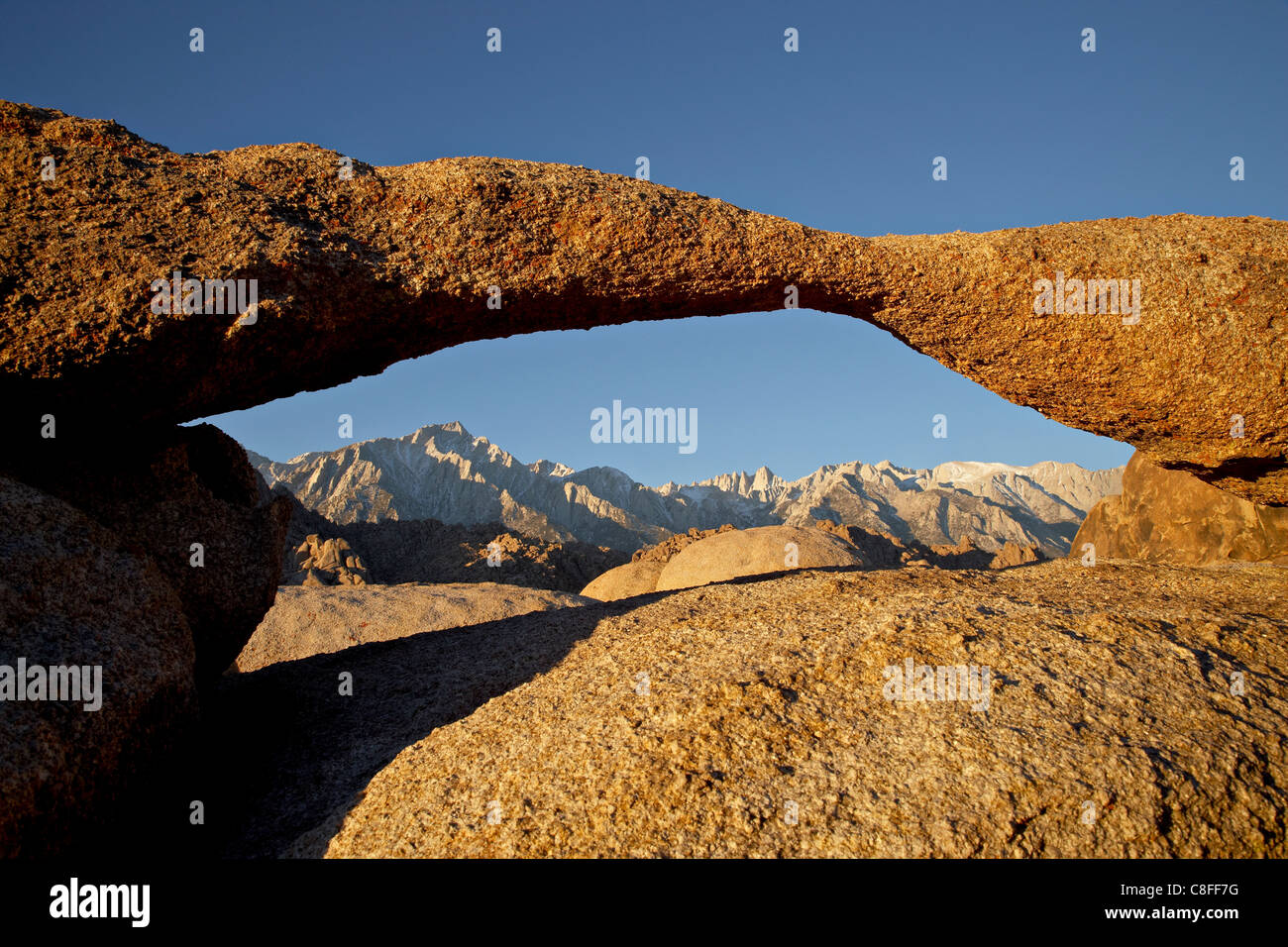 Lathe Arch framing Mount Whitney at first light Alabama Hills, Inyo National Forest, California, United States of America Stock Photo