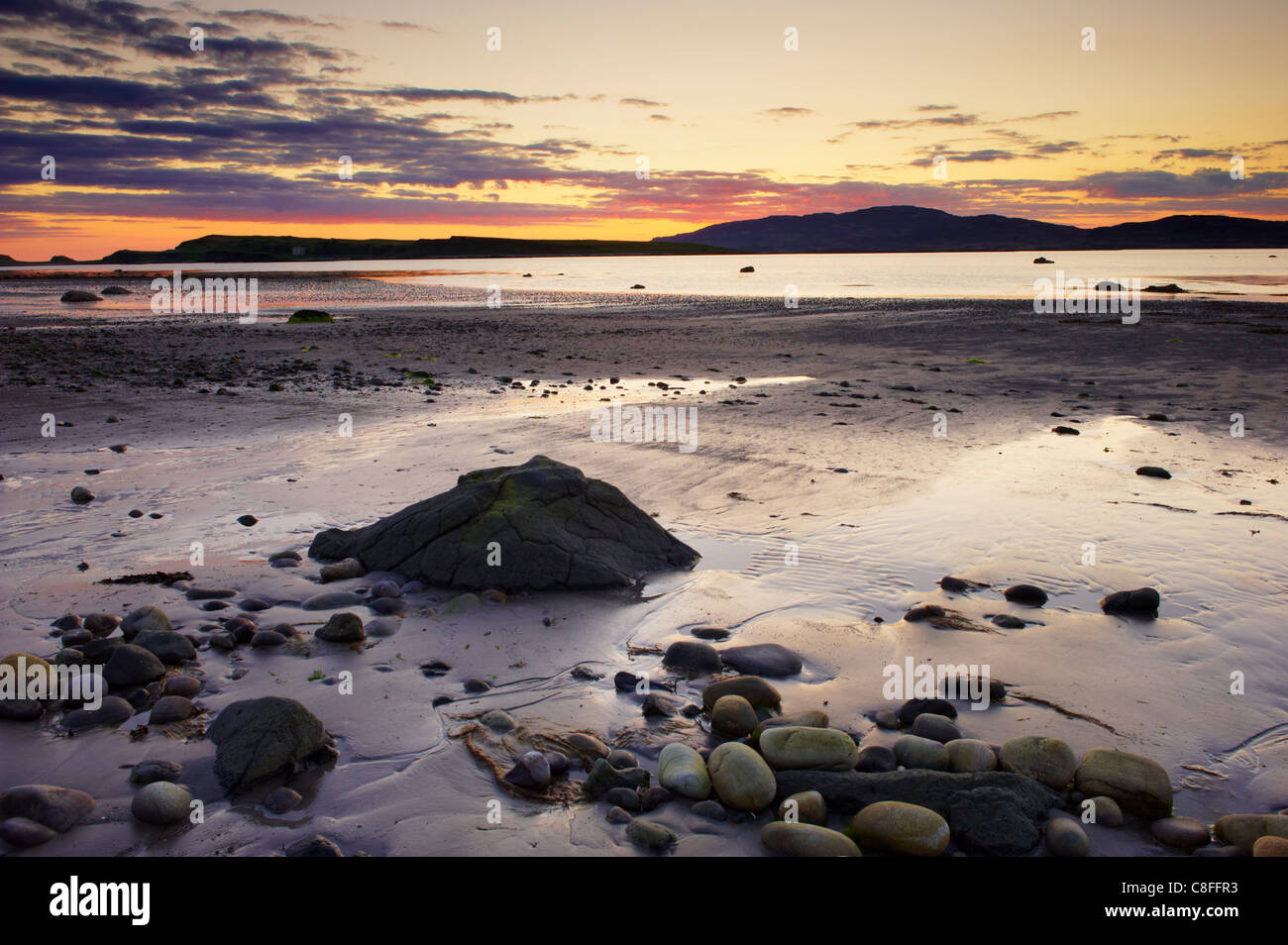 Sunset on Loch na Keal and Inch Kenneth island, Isle of Mull, Inner Hebrides, Scotland, United Kingdom Stock Photo