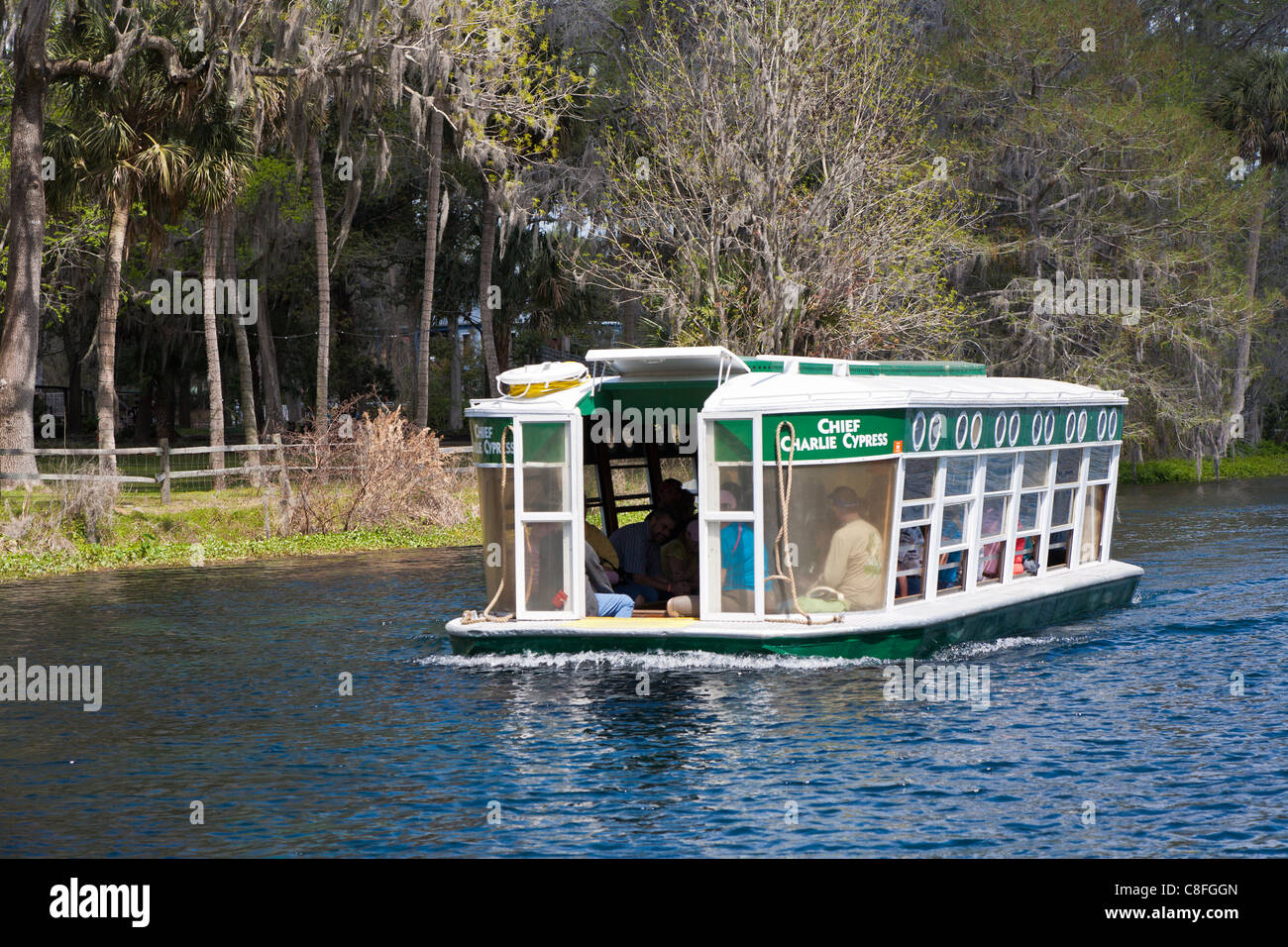 Park guests take glass bottom boat tour of the Silver River at Silver