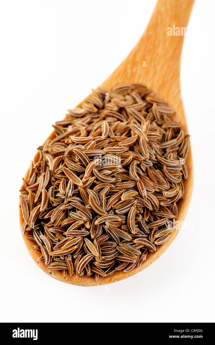 cumin seeds in wooden spoon Stock Photo