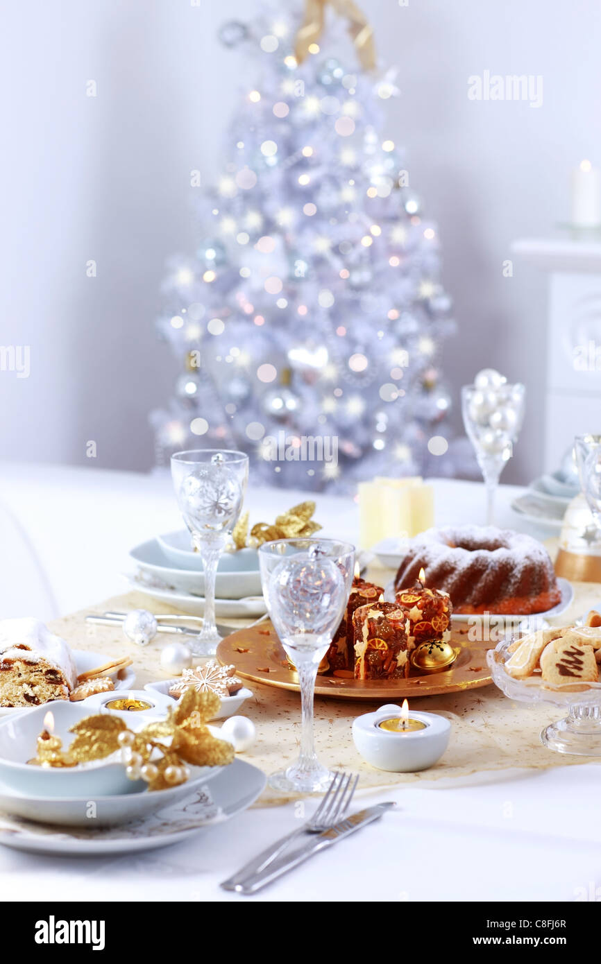 Place setting for Christmas with Christmas tree Stock Photo