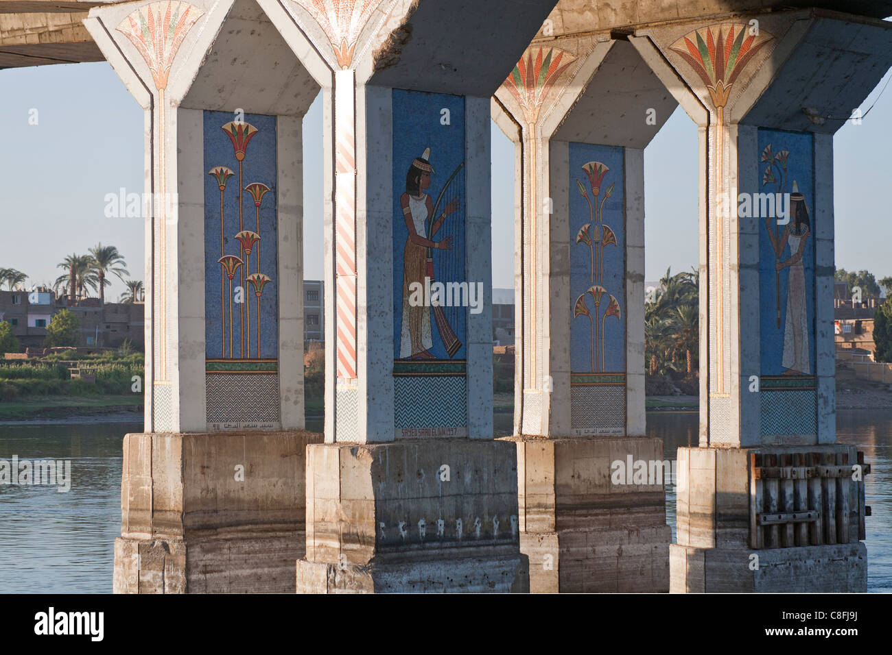 Passing close under Luxor bridge showing four pillars decorated with mosiac in Pharaonic style, Luxor, Egypt, Africa Stock Photo