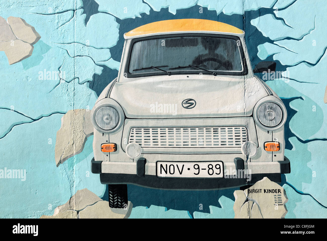 Mural of Trabant car breaking through Berlin Wall Stock Photo - Alamy