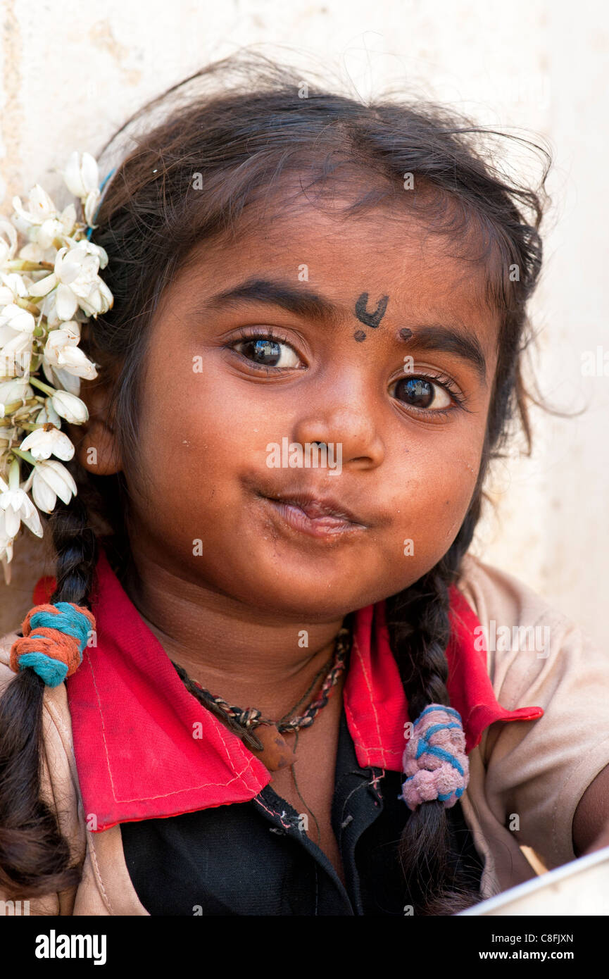 Young poor lower caste Indian street girl smiling. Andhra Pradesh, India Stock Photo