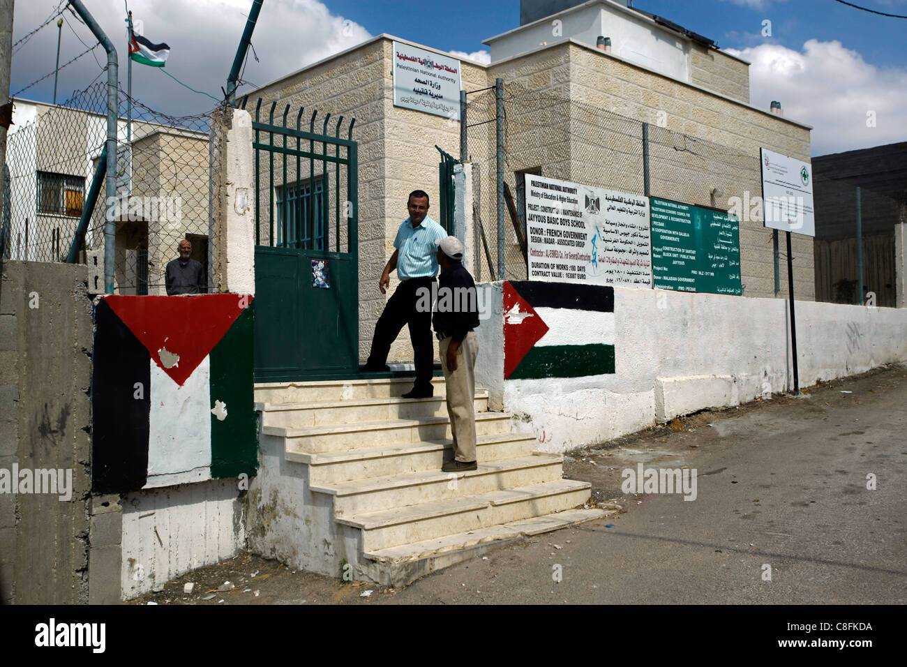 Palestinian flags painted at the entrance to council house of Jaayus village West bank Occupied Palestinian territories Israel Stock Photo