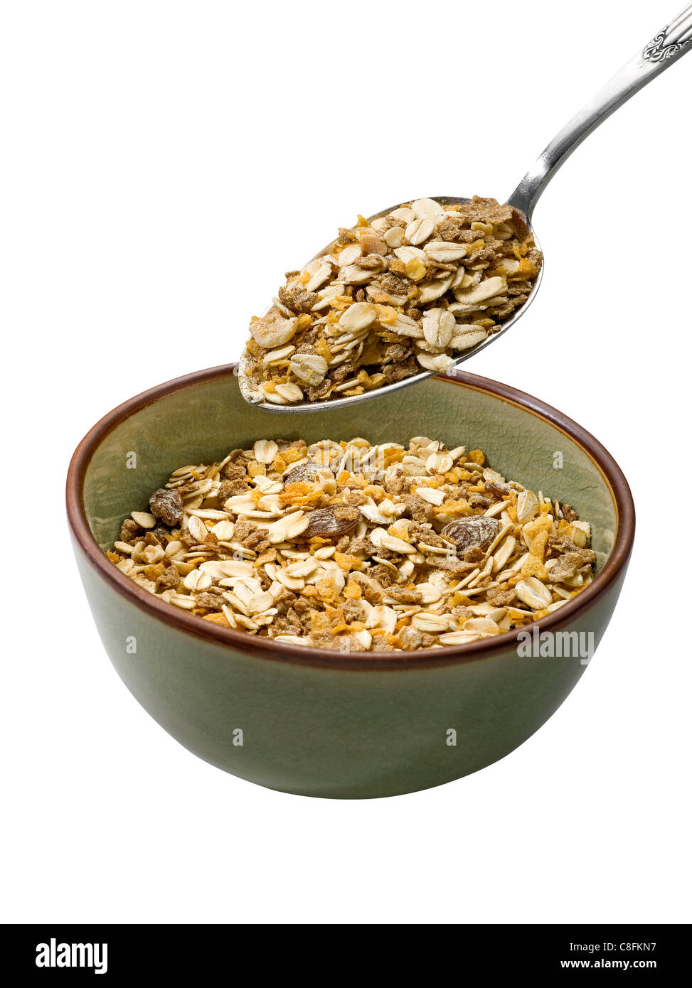 Bowl of muesli on white background Stock Photo