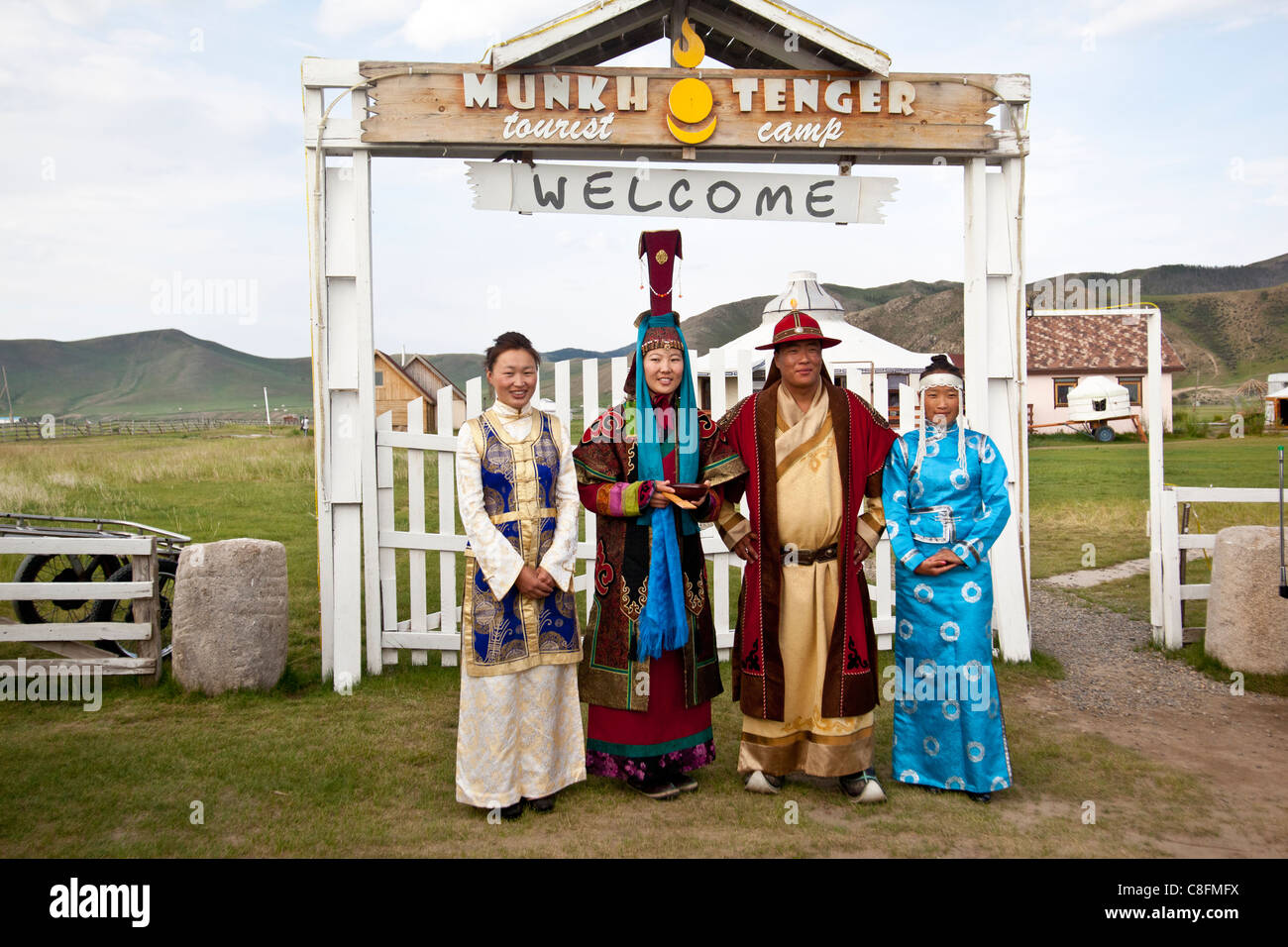 Nomad Mongolians in traditional dress preparing for a welcoming ...