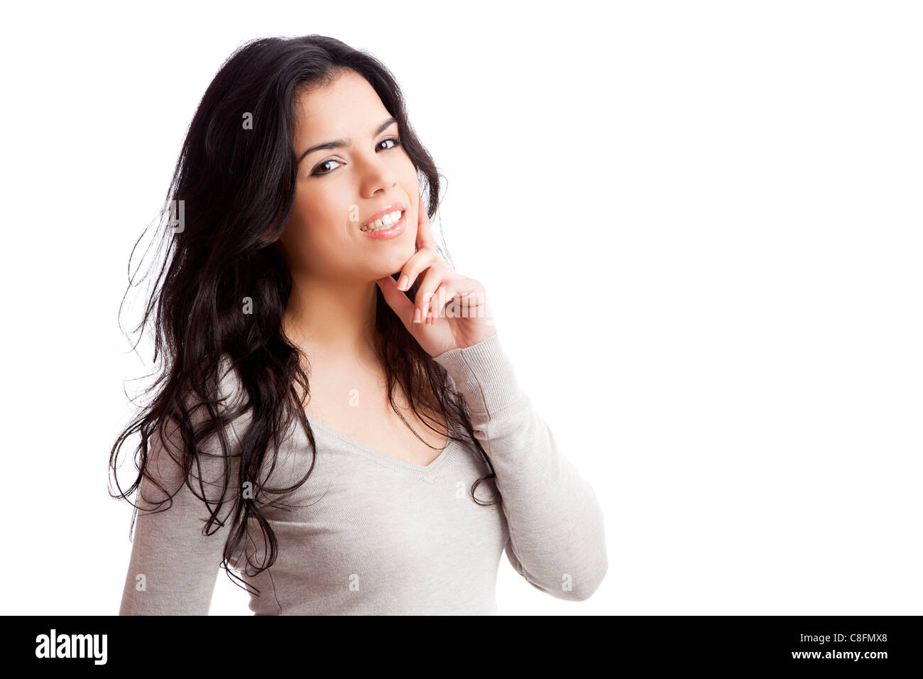 Portrait of a beautiful young woman smiling, isolated over white ...