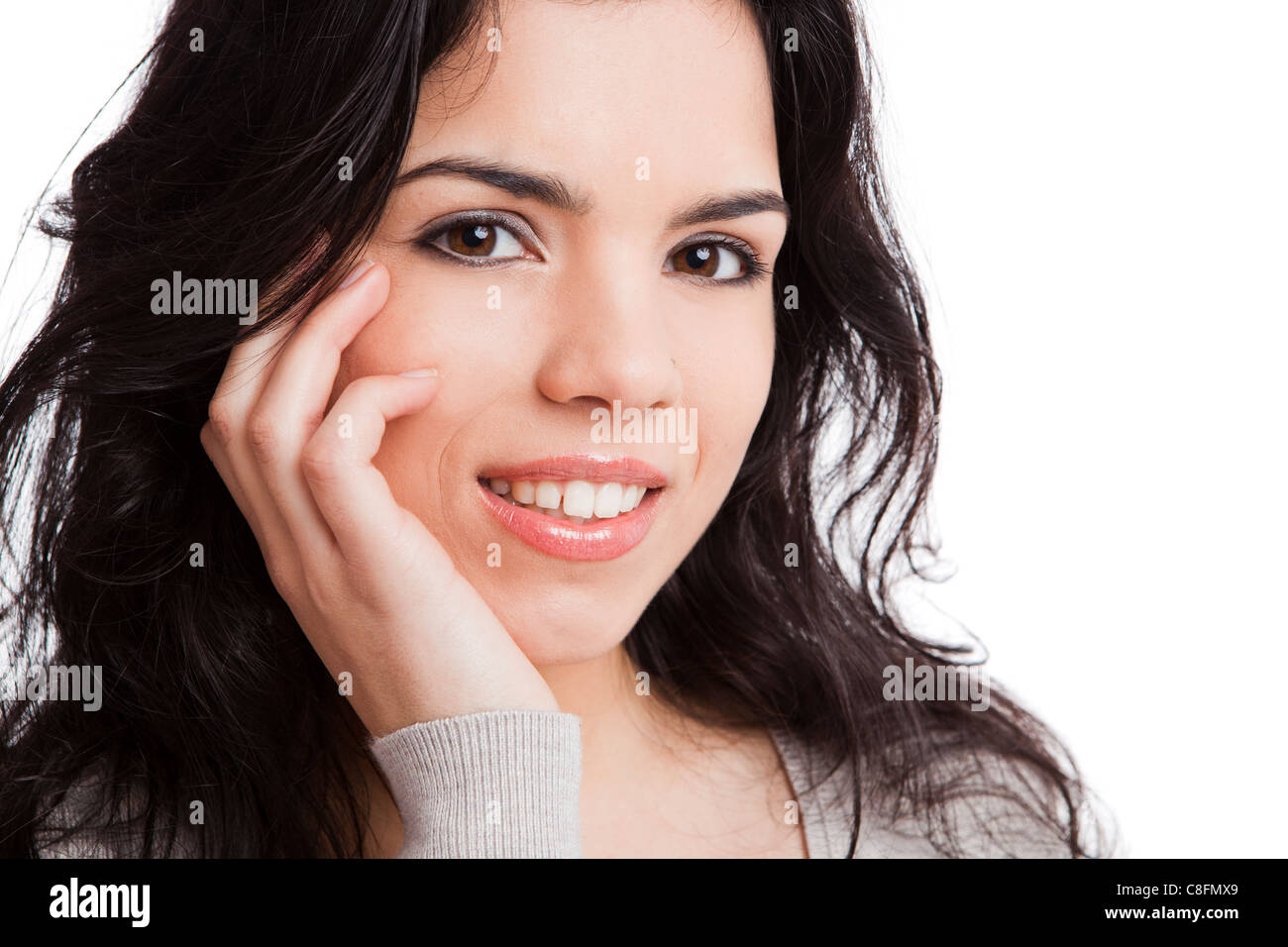Portrait of a beautiful young woman smiling, isolated over white ...