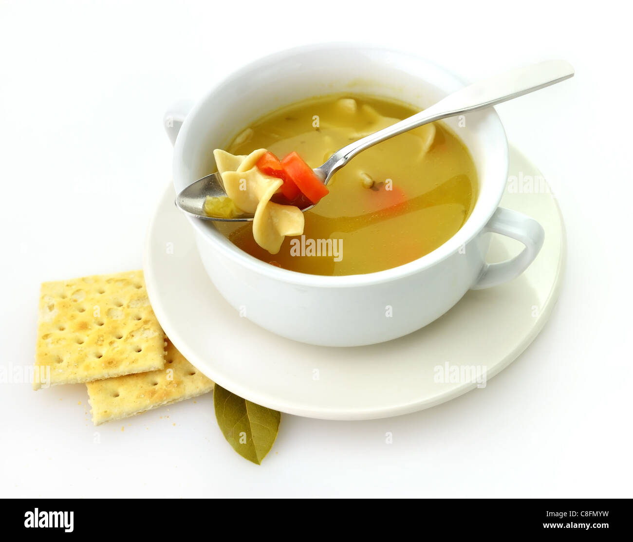 https://c8.alamy.com/comp/C8FMYW/chicken-noodle-soup-in-a-white-cup-with-crackers-C8FMYW.jpg