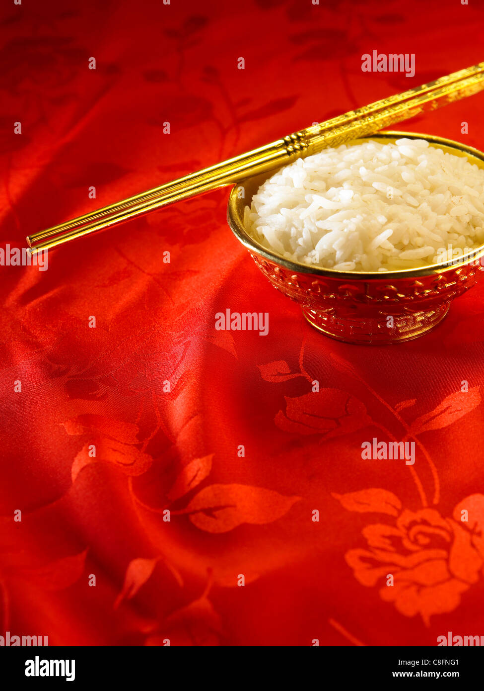 bowl of rice with chopsticks resting on it Stock Photo Alamy