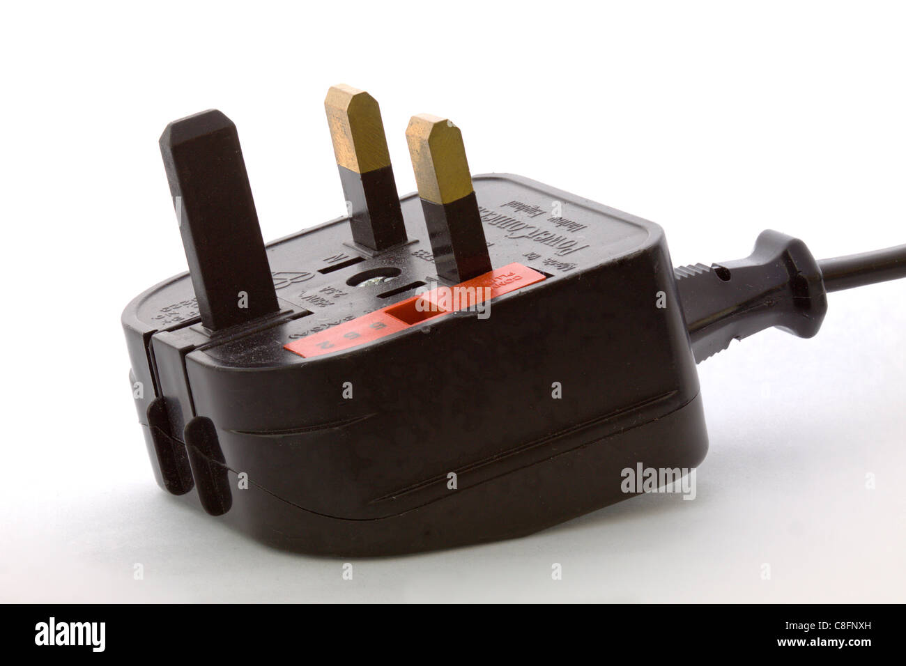 Black 3 pin electricity plug (with extremely deep depth of field created using focus stacking) Stock Photo