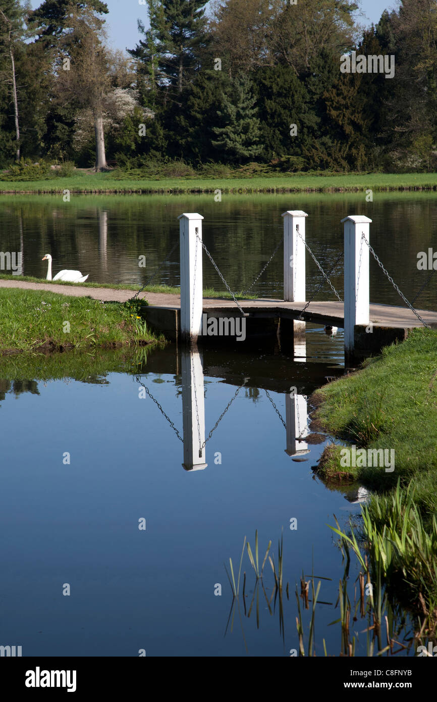 A peaceful calm lake and small bridge. Stock Photo