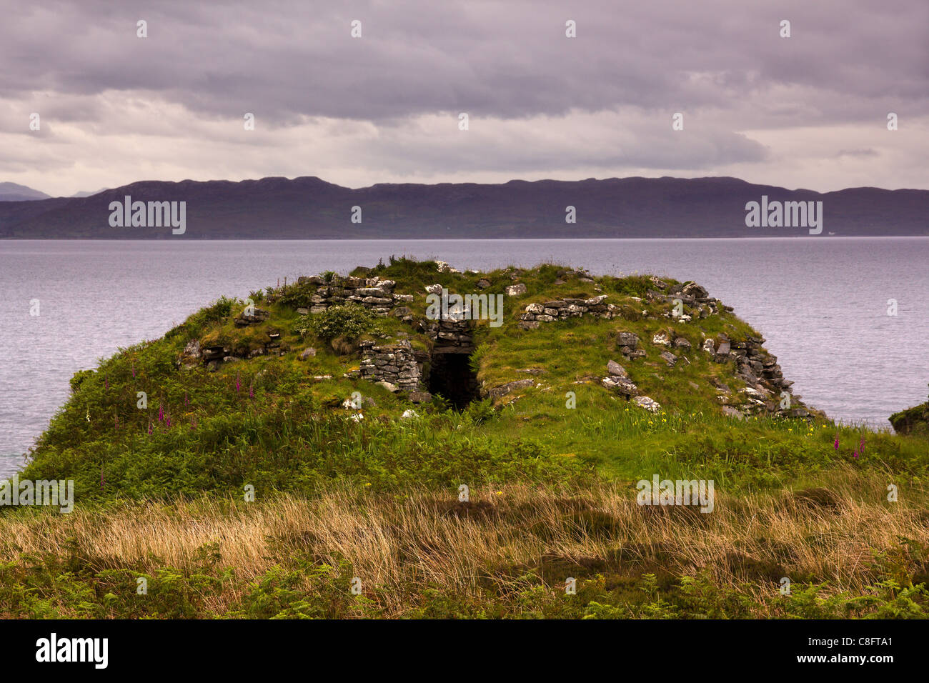 Ruin of Dun Ringill iron age hill fort on a promontory overlooking Loch Slapin, Kilmarie, Isle of Skye, Scotland, UK Stock Photo