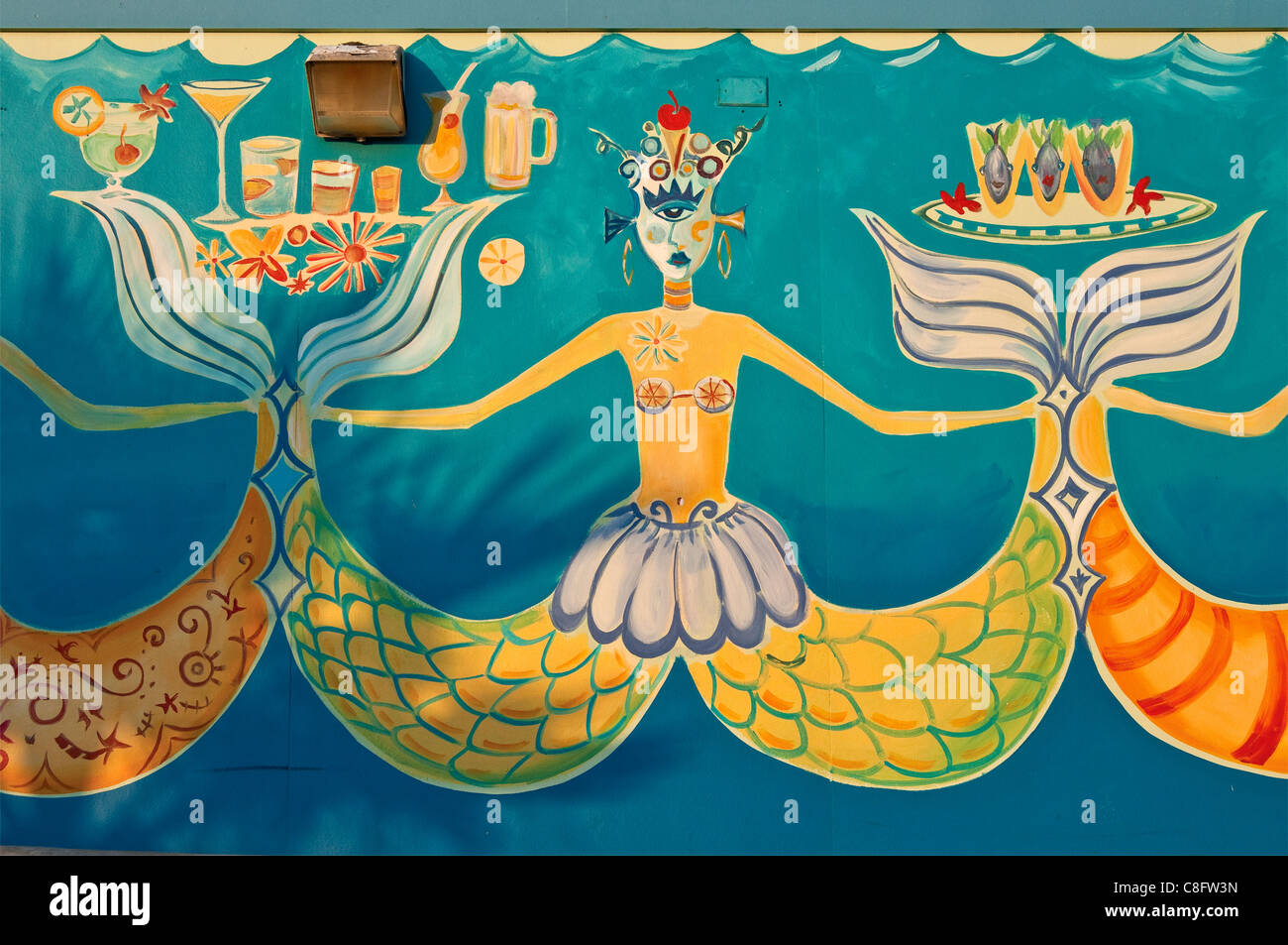 Painting on wall at Float Pool & Patio Bar on Seawall Boulevard facing