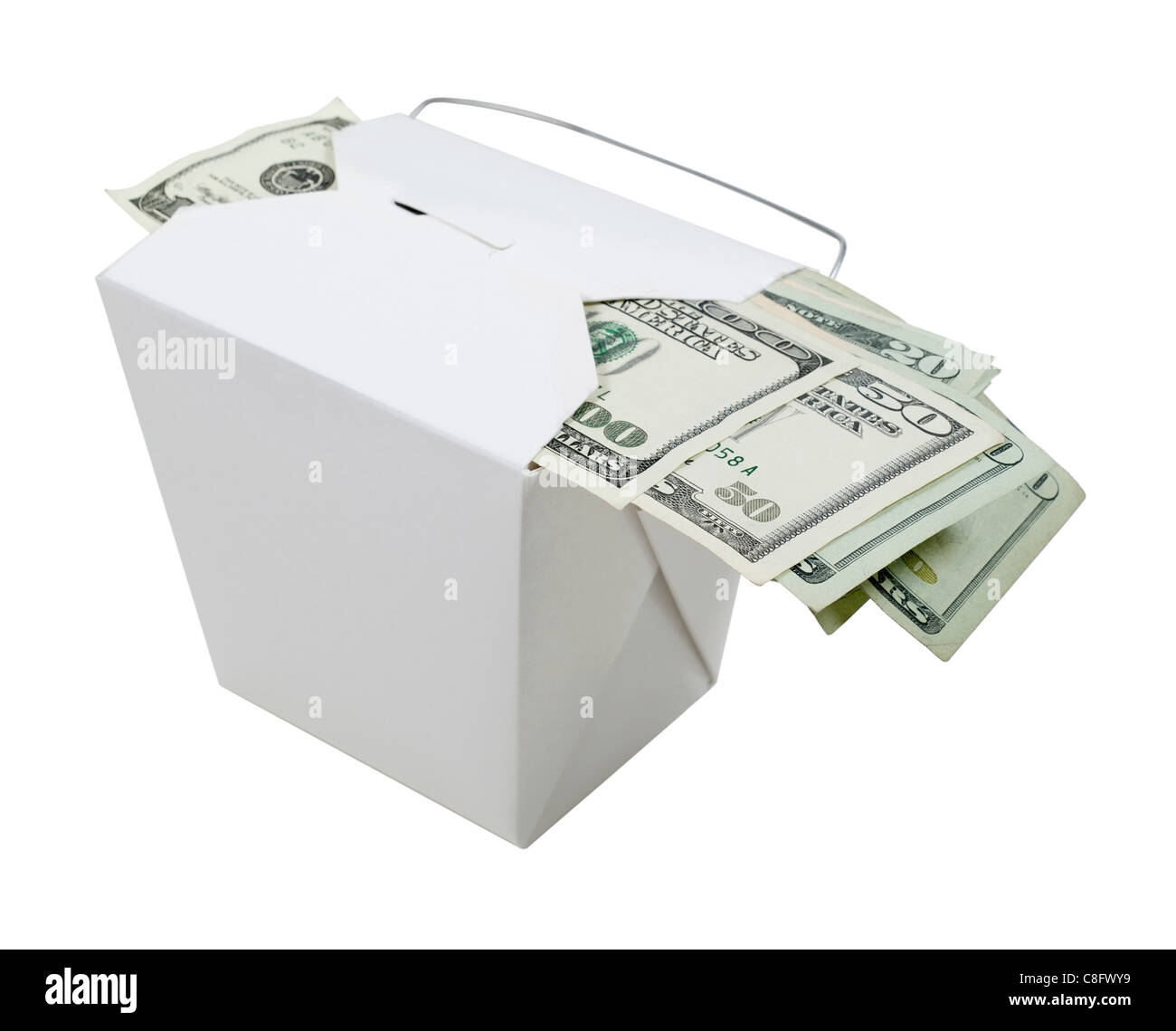 Money in the form of many large bills left as a tip in a take out box - path included Stock Photo