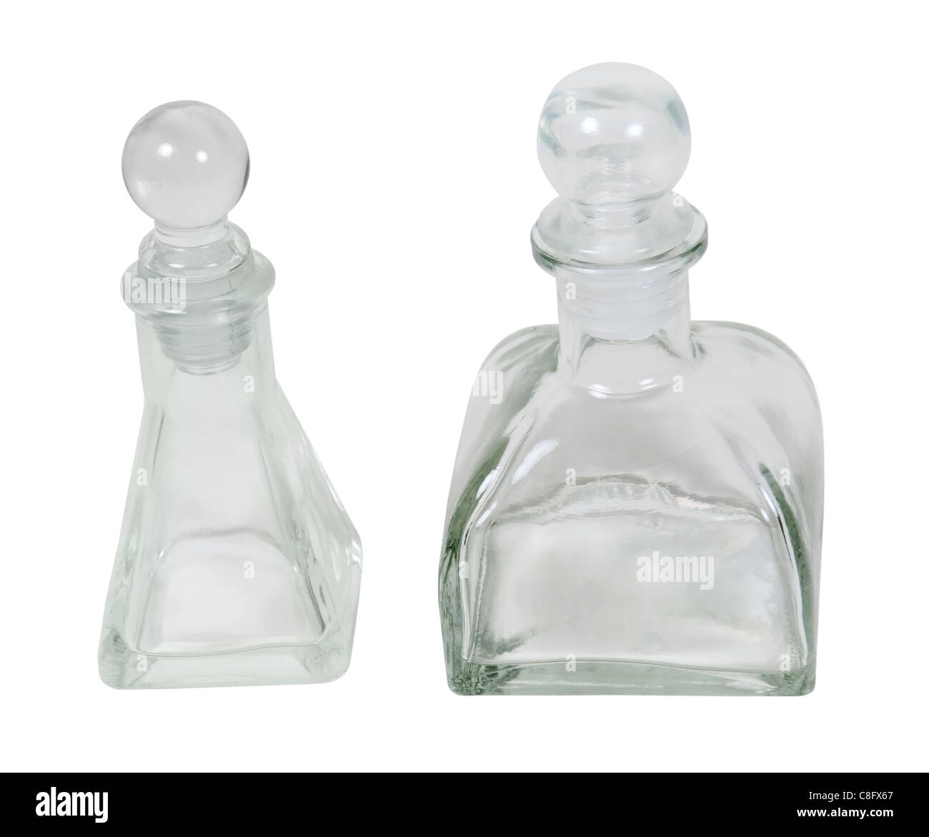 Square glass bottles with glass stoppers path included Stock Photo