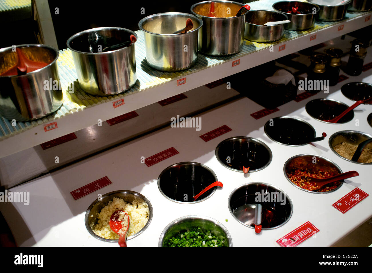https://c8.alamy.com/comp/C8G22A/various-sauces-at-hai-di-lao-hot-pot-restaurant-in-beijing-china-21-C8G22A.jpg