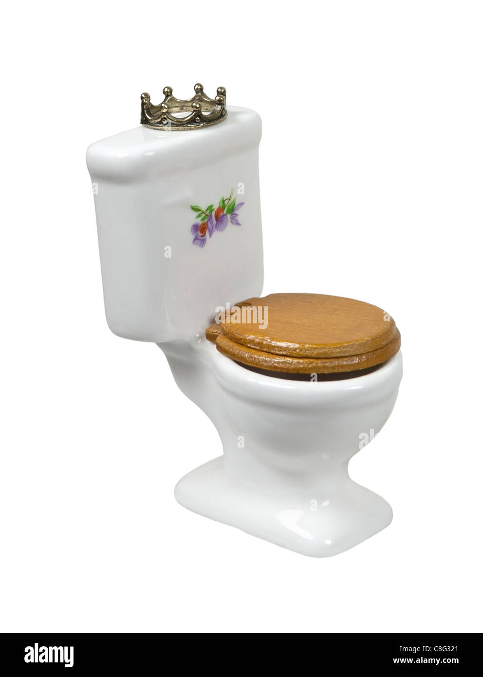 The home throne shown by a porcelain toilet with wooden seat with a crown - path included Stock Photo