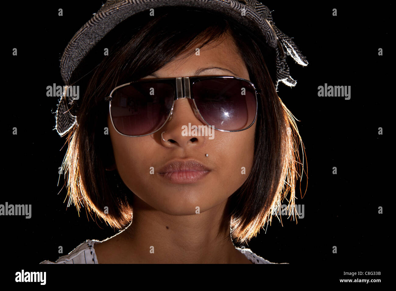 Beautiful black woman at beach wearing sunglasses Stock Photo by Rido81