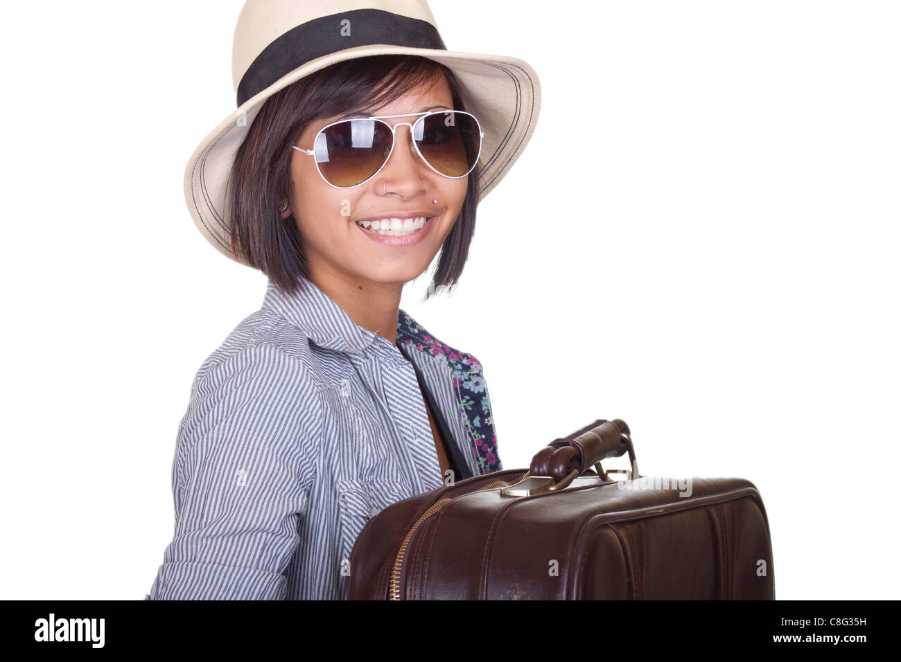 A travel or business image of a beautiful Asian girl with a hat and