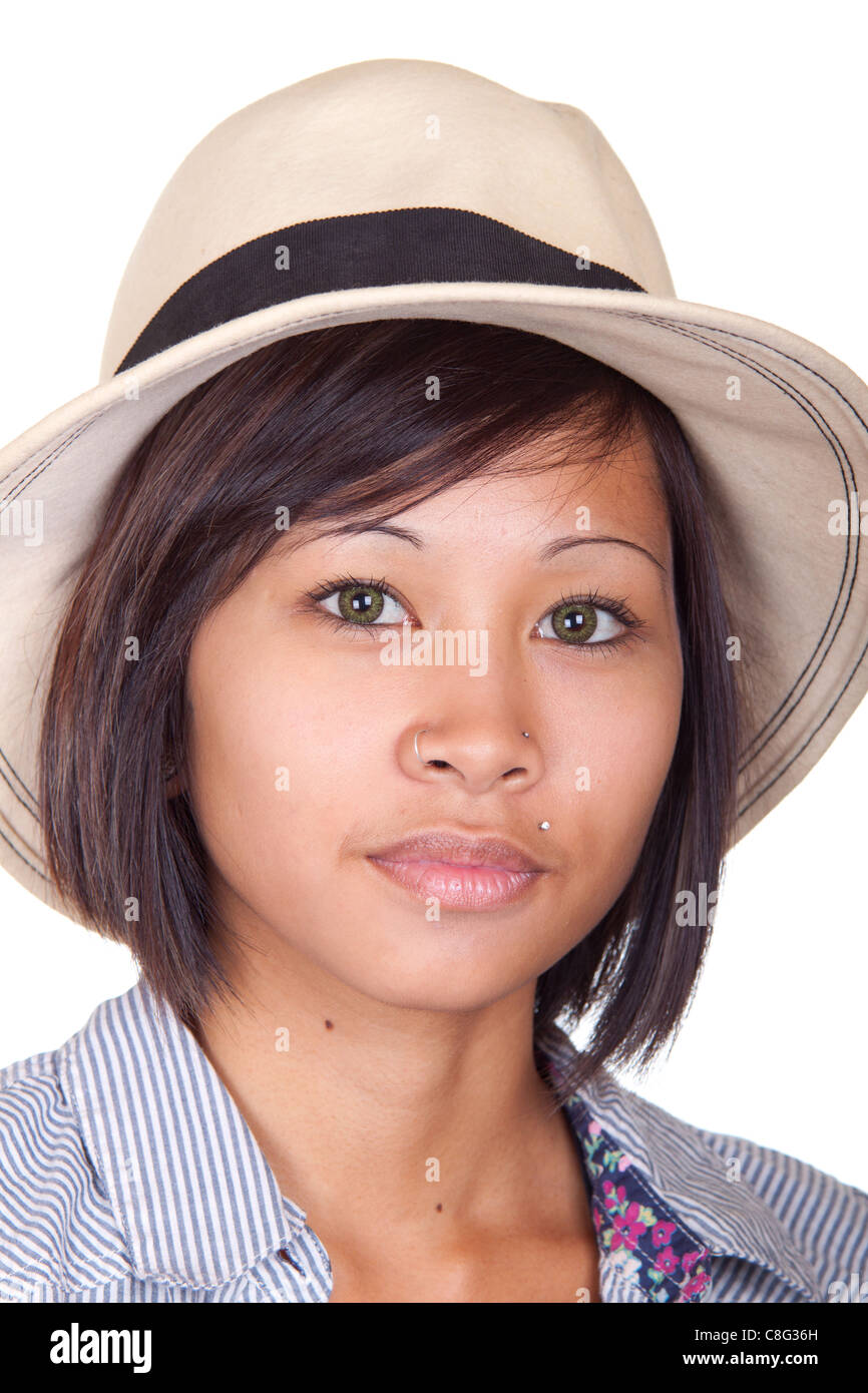 A travel or business image of a beautiful Asian girl with a hat on