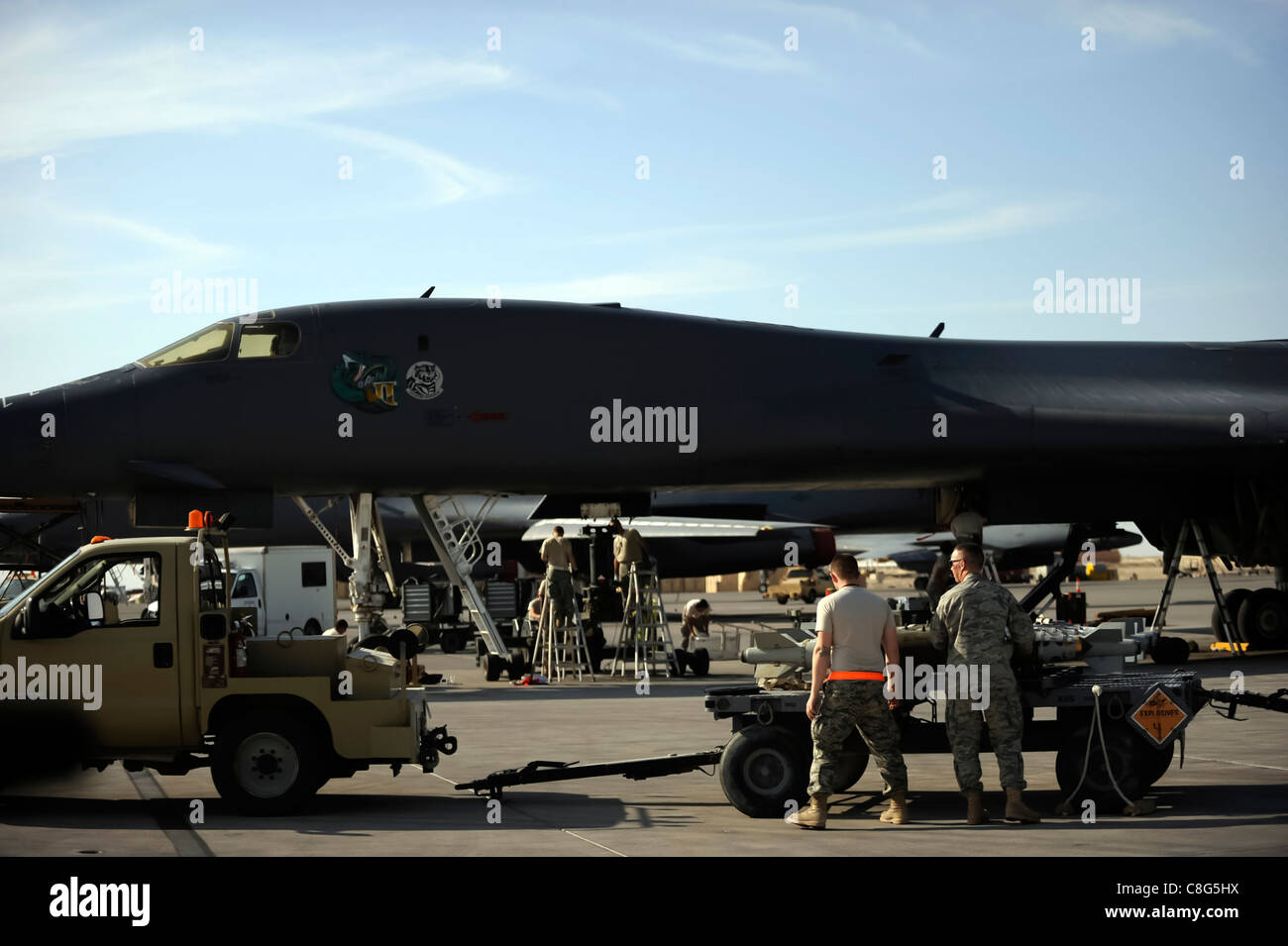 Airmen load bombs on a B-1B Lancer Jan. 23, 2010, at an air base in Southwest Asia. Stock Photo