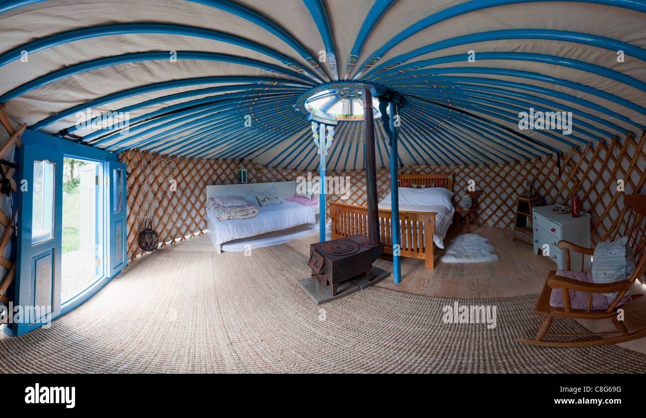 Inside of a Mongolian Yurt used as holiday accommodation Stock Photo
