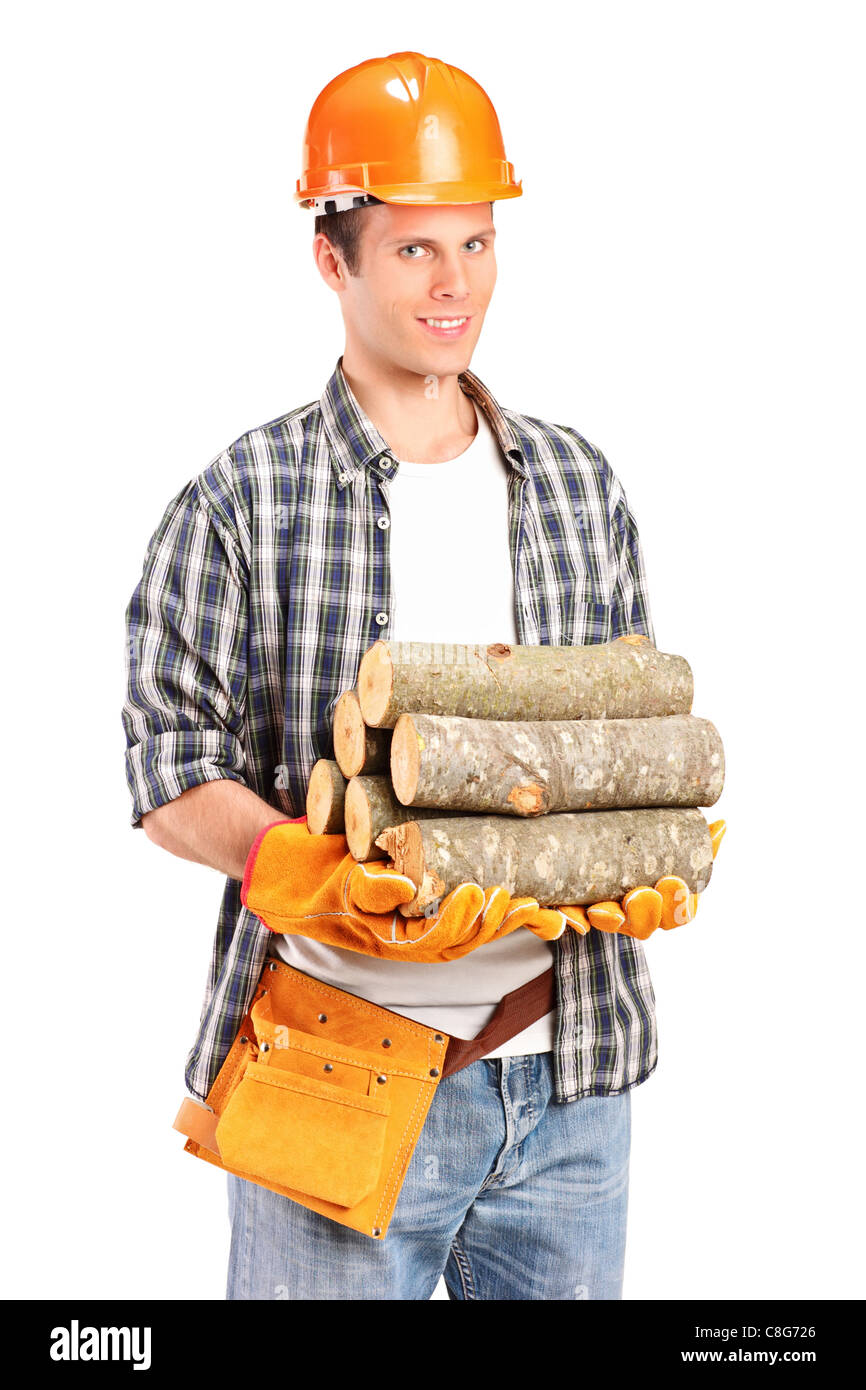 A studio shot of a young lumberjack holding a firewoods Stock Photo