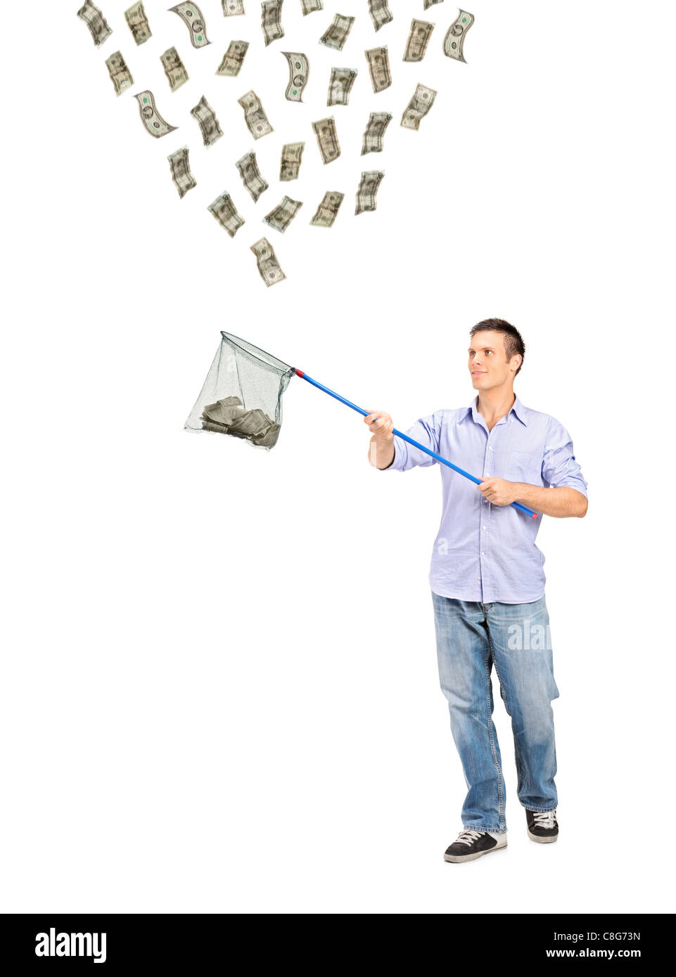 Full length portrait of a man collecting US dollars with a fishing net ...