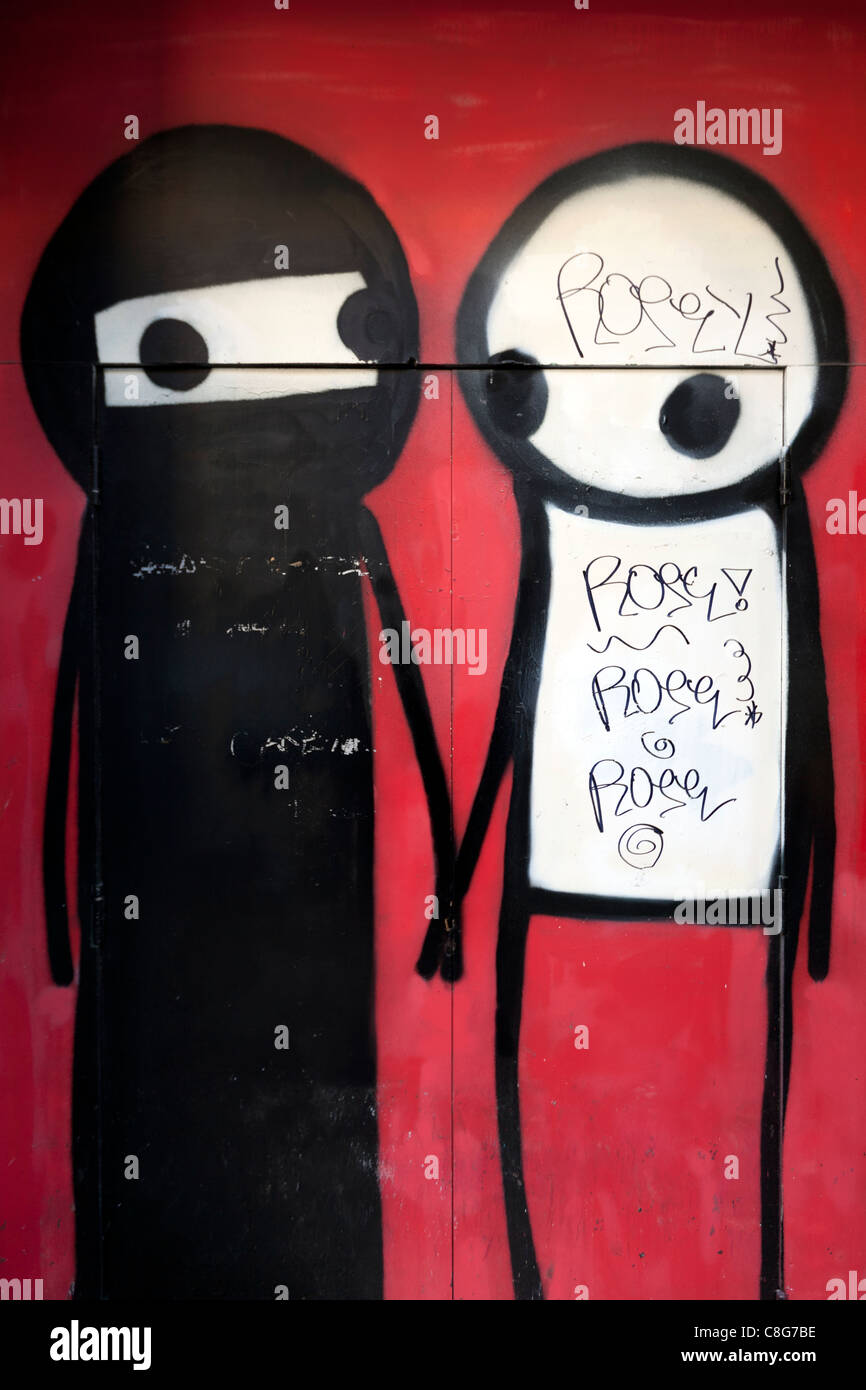 Stik figures painted in a doorway, Princelet Street, Spitalfields, London, UK. Stock Photo