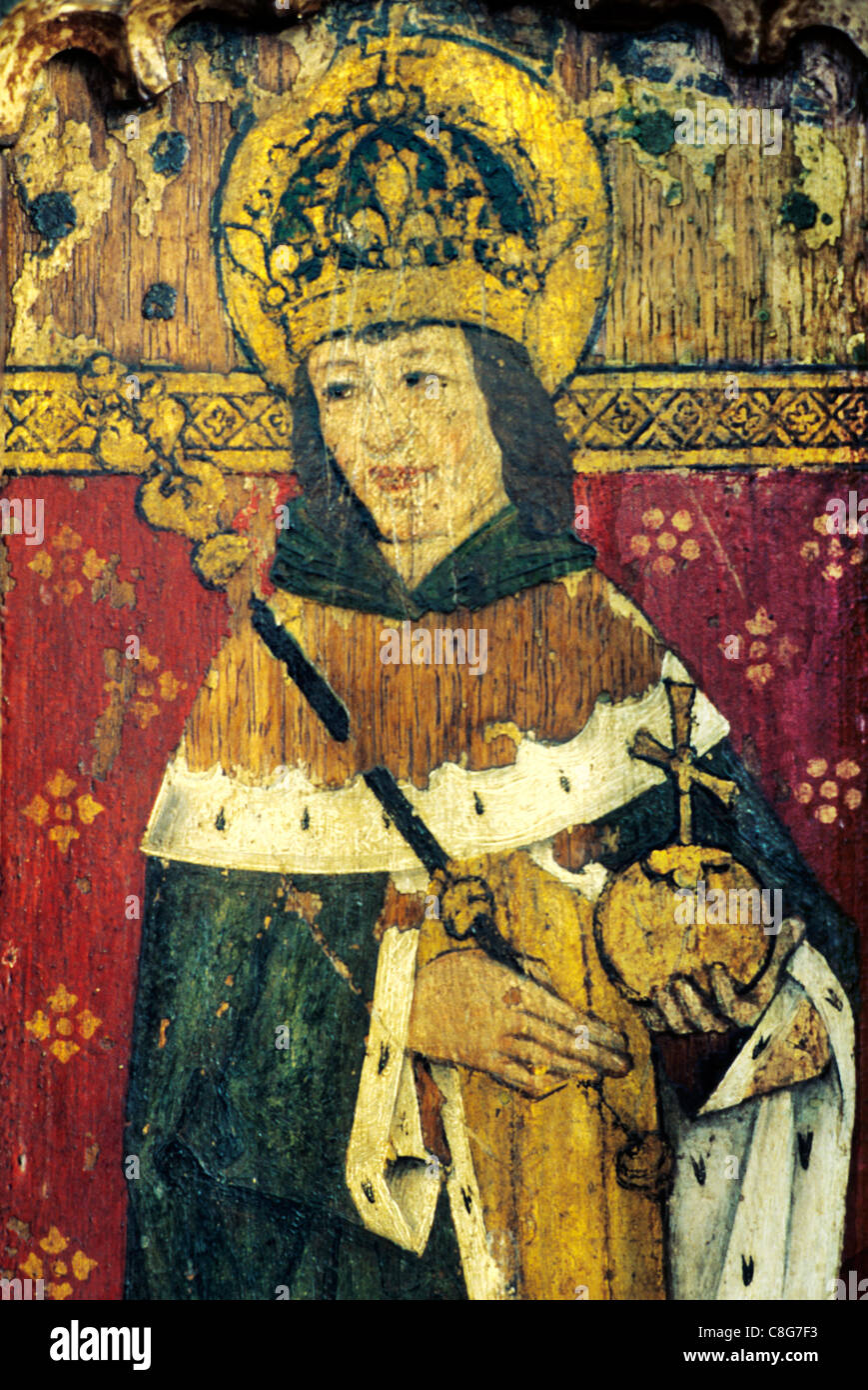 Ludham, Norfolk, rood screen, King Henry 6th, orb, sceptre male saint saints English medieval screens painting paintings painted Stock Photo