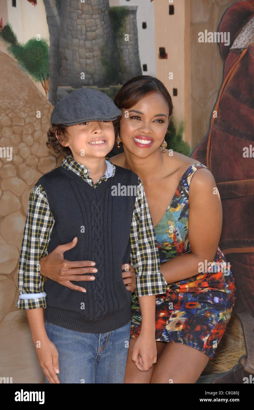 Kai Miles, Sharon Leal at arrivals for PUSS IN BOOTS Premiere, Regency Village Theater in Westwood, Los Angeles, CA October 23, 2011. Photo By: Michael Germana/Everett Collection Stock Photo