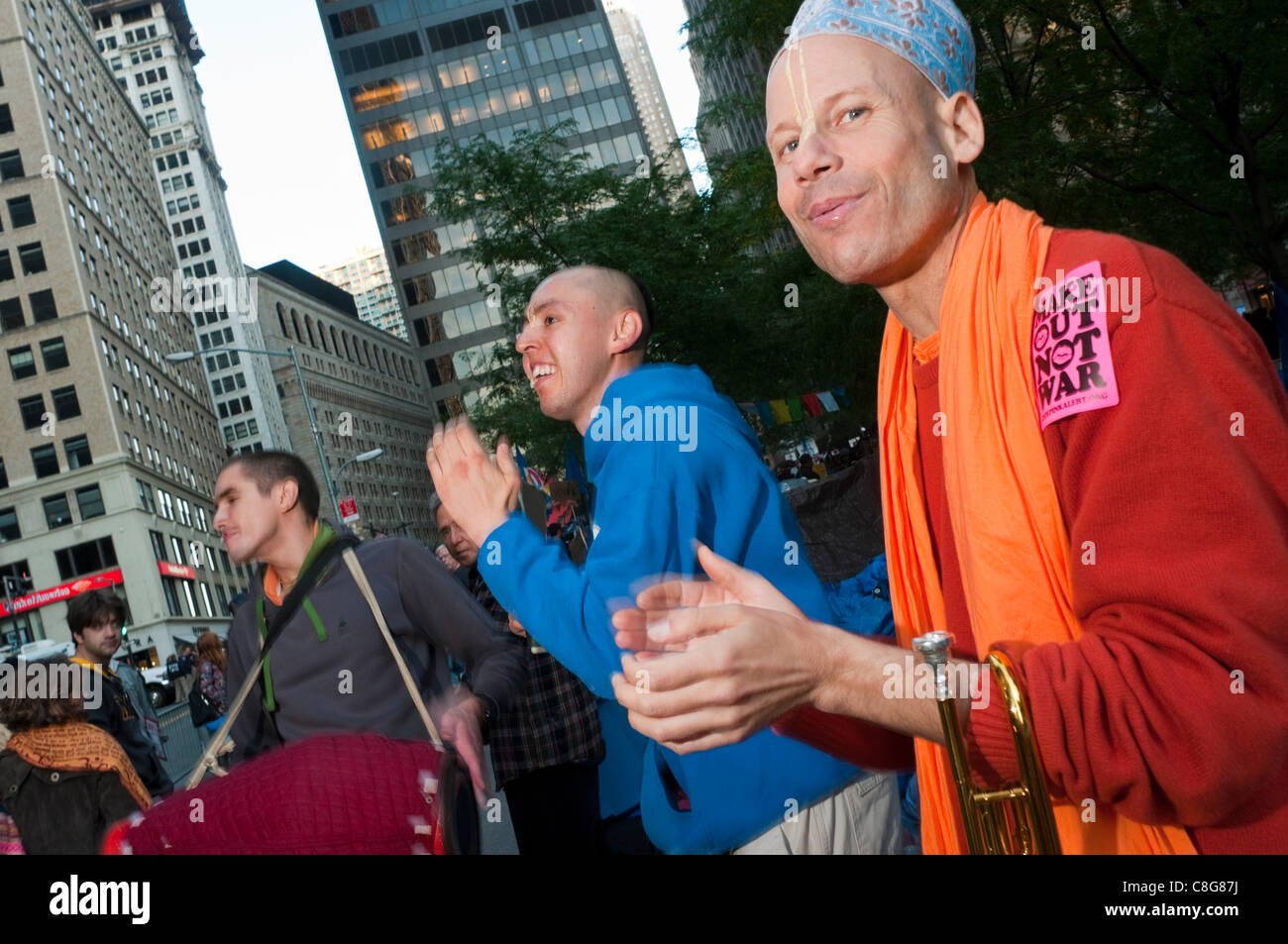 New York, NY -  23 October 2011 - Devotees of Hare Krishna join anti-Wall Street protesters in Liberty Square, Zuccotti Park. Occupy Wall Street Stock Photo