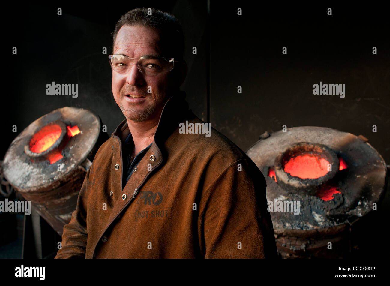 Foundry workers in small metal casting foundry in Perth Western Australia Stock Photo