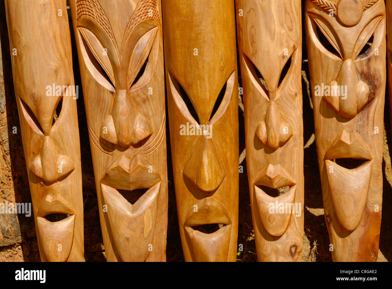 Wooden carved heads for sale, Nosy Be, Madagascar Stock Photo