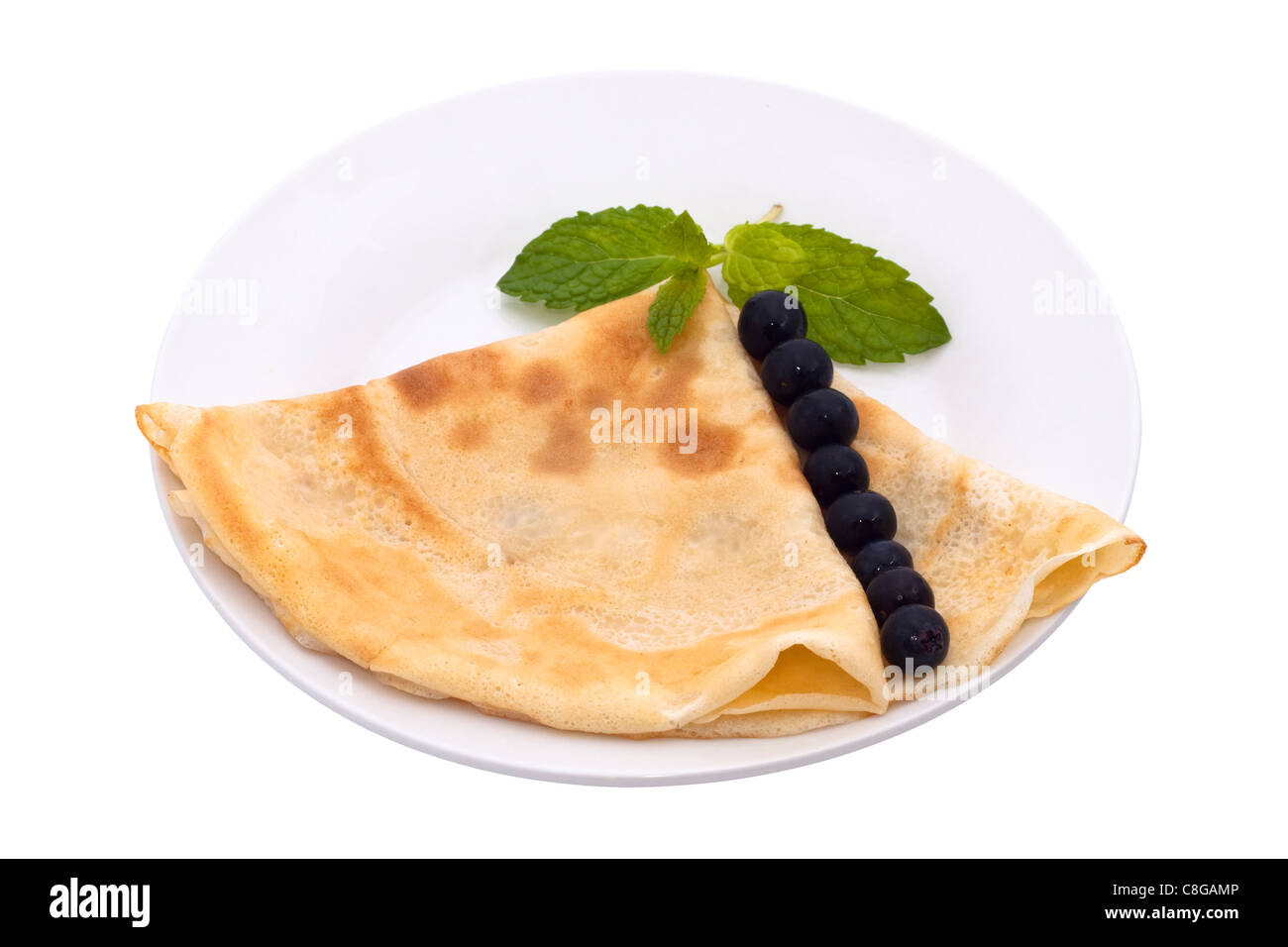 Light Crepe with blueberries, isolated on white background. Stock Photo