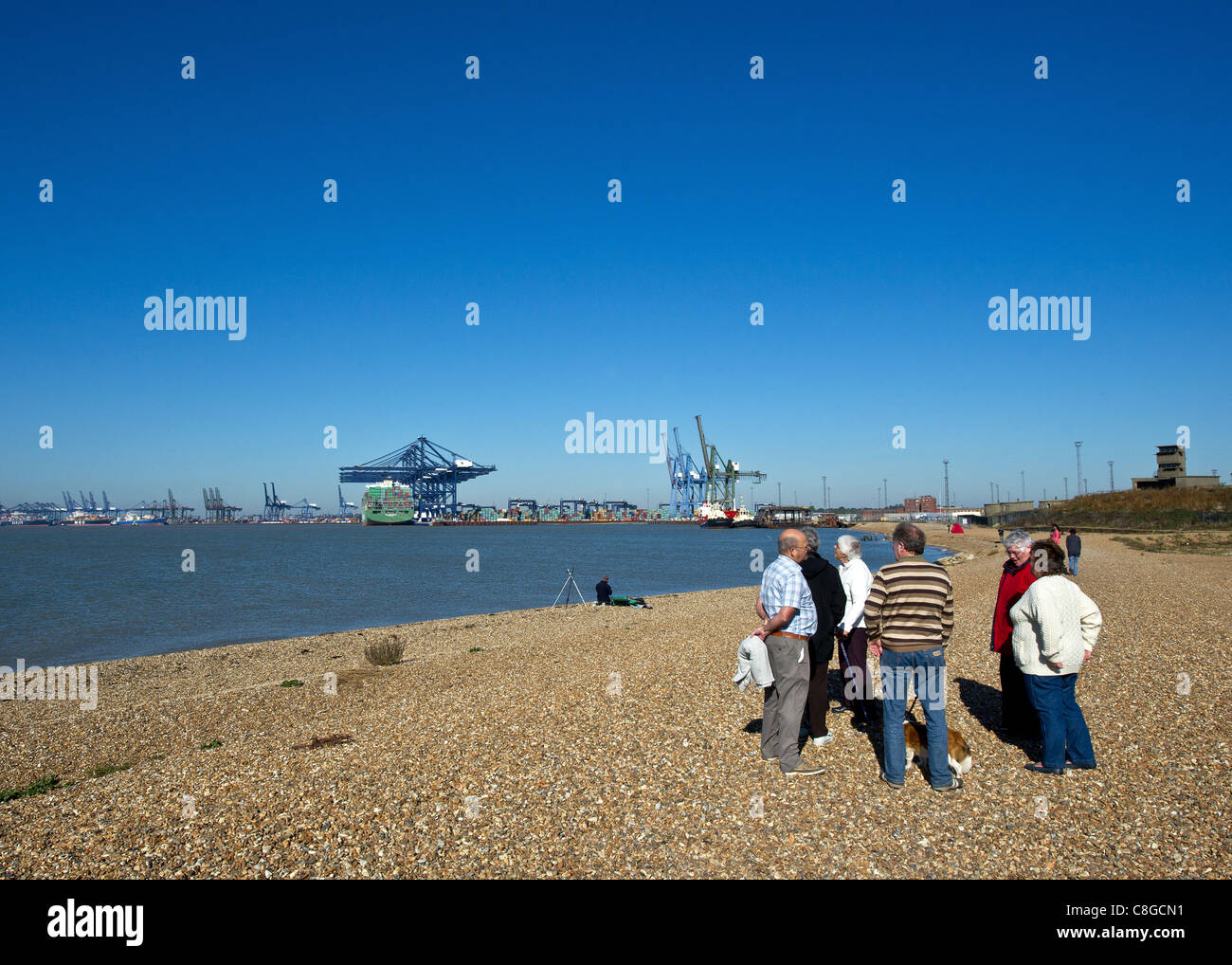 A group of people talking on Landguard Point Stock Photo - Alamy