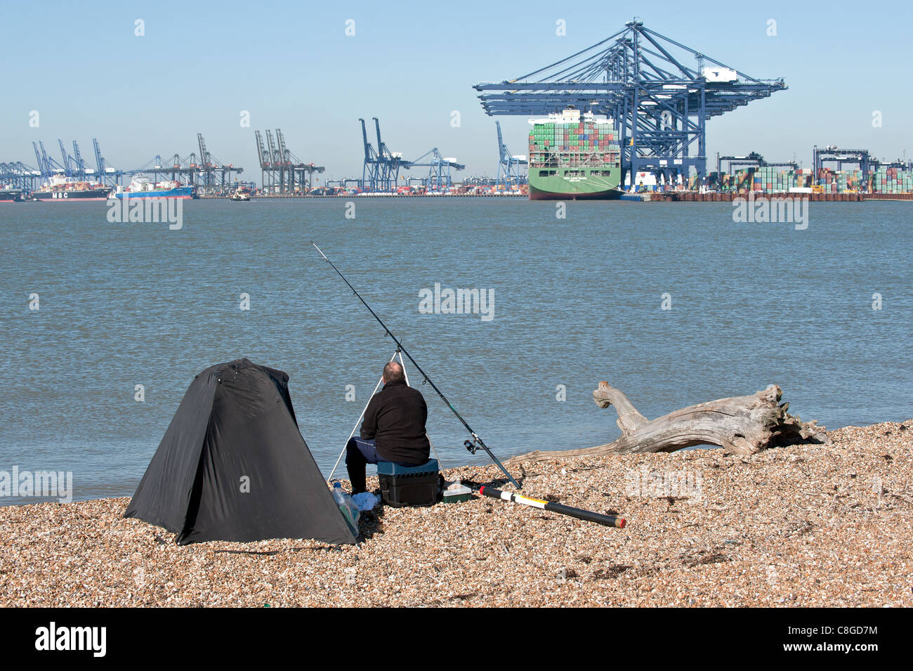 An angler fishing on the River Orwell Stock Photo