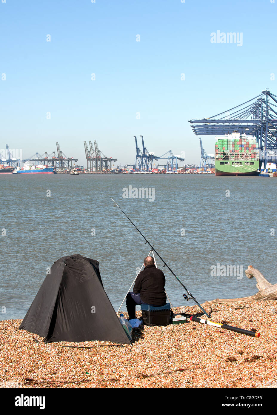 An angler fishing on the River Orwell Stock Photo