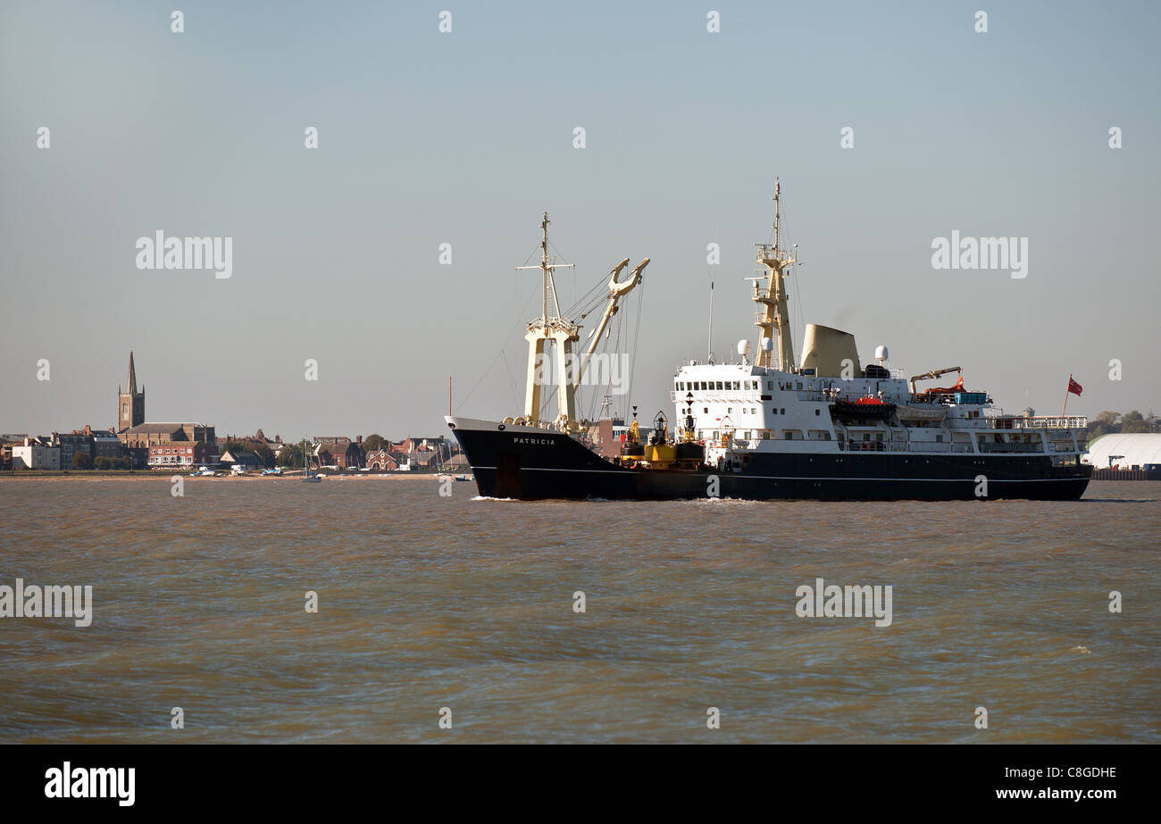 The Patricia steaming downriver on the River Orwell. Stock Photo