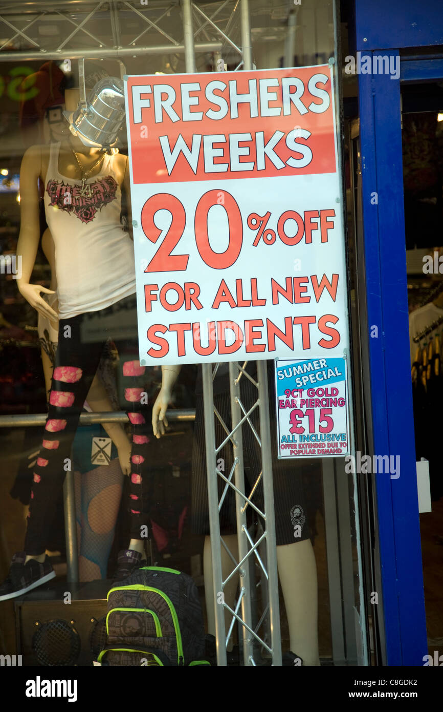 Freshers Week discount shop prices offer poster in window, Hull, Yorkshire, England Stock Photo