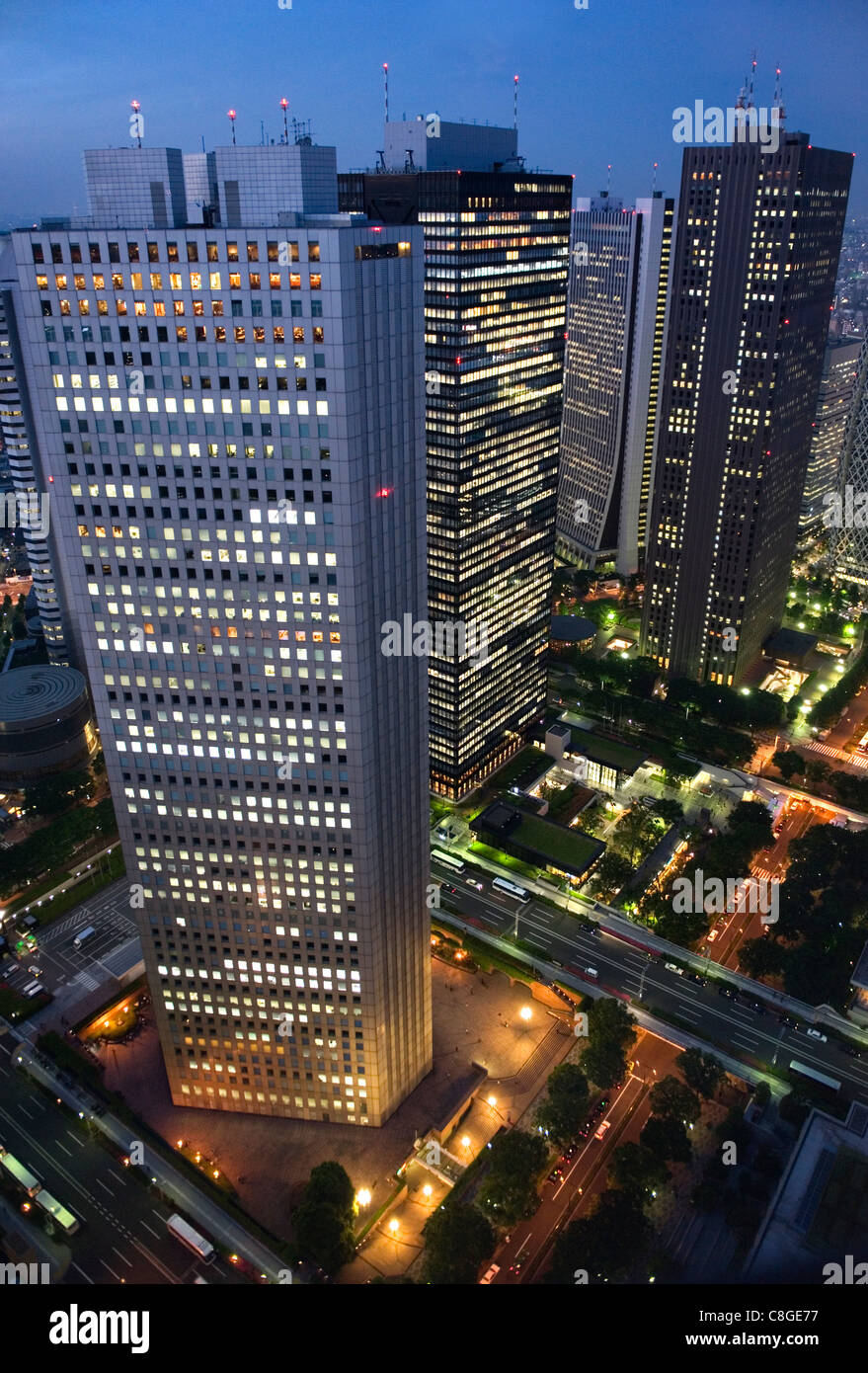 Evening skyline view of skyscraper corporate buildings in Nishi Shinjuku (West Shinjuku, Tokyo, Japan Stock Photo