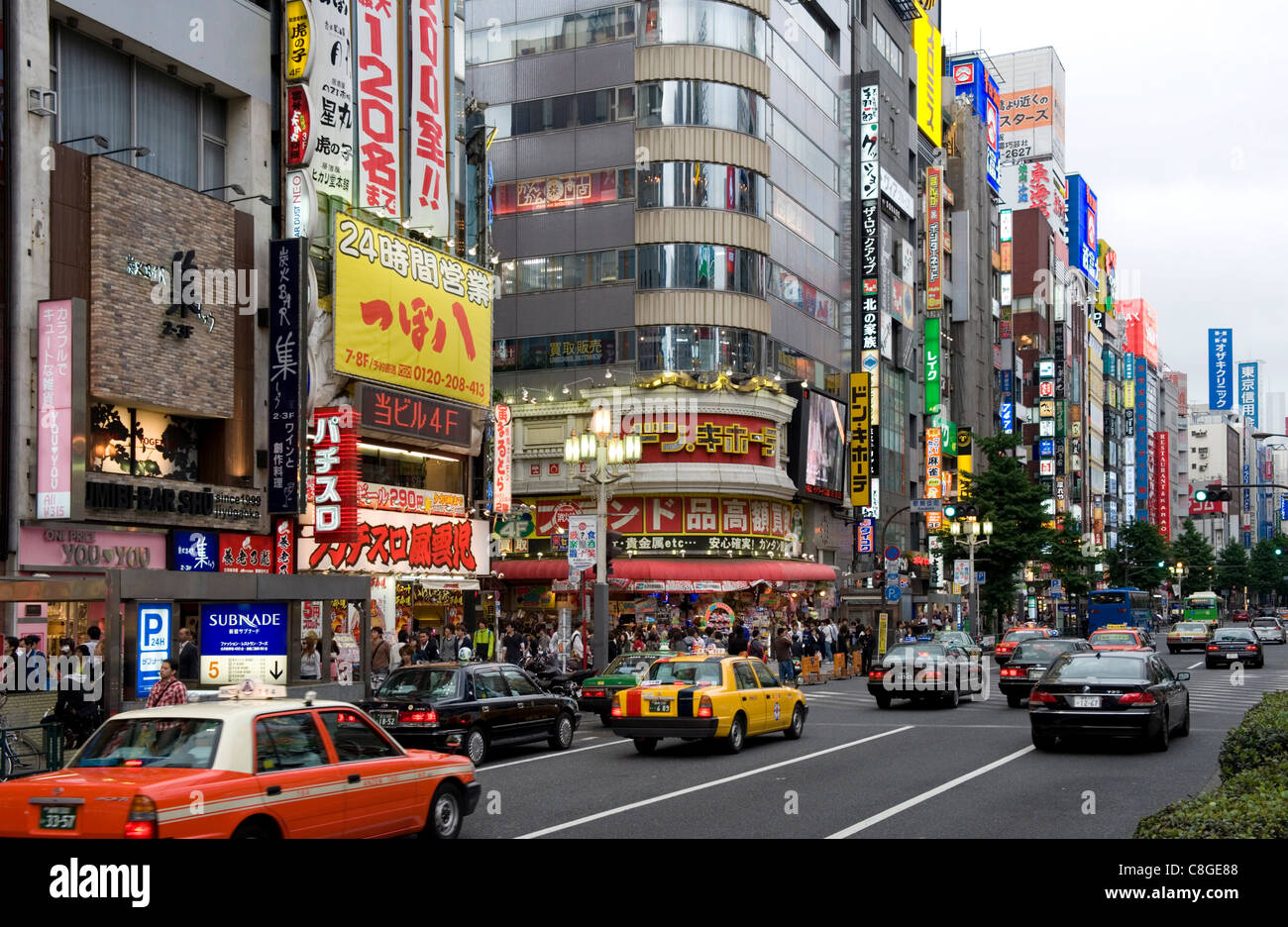 Neon signs light up the Kabukicho entertainment district in Shinjuku, Tokyo, Japan Stock Photo