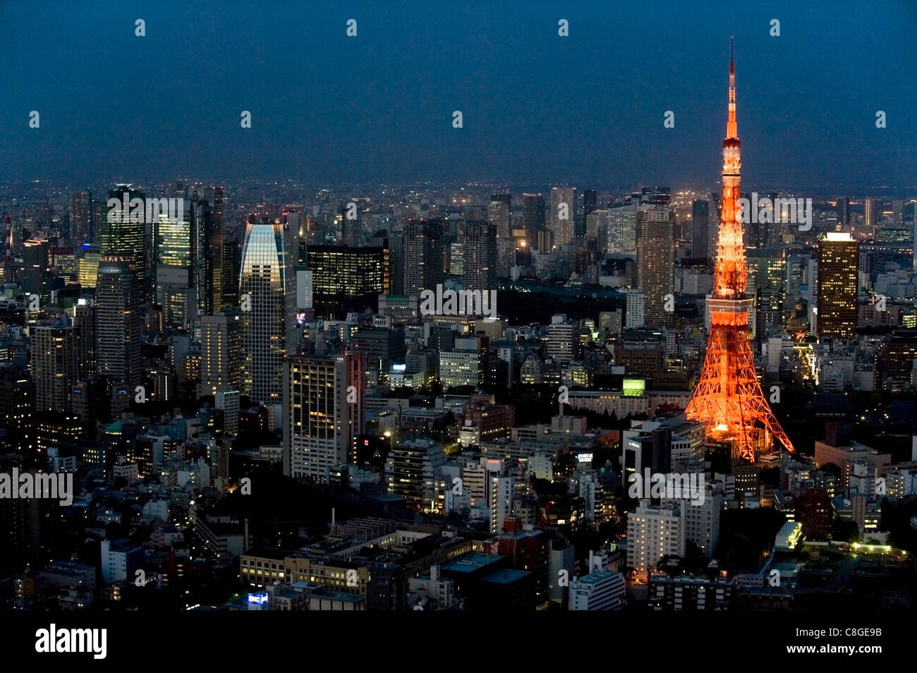 Aerial view of metropolitan Tokyo and Tokyo Tower from atop the Mori Tower at Roppongi Hills, Tokyo, Japan Stock Photo