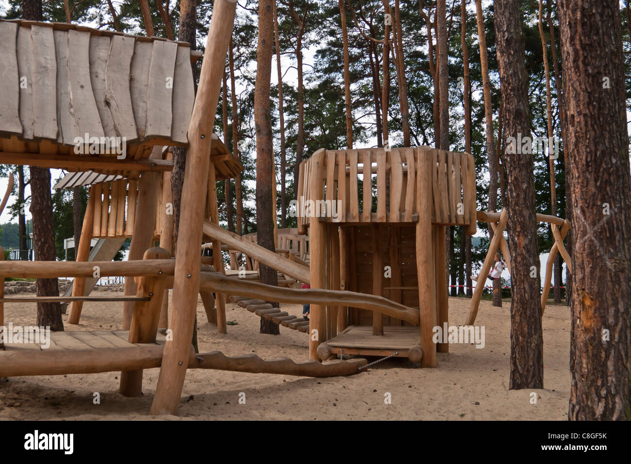 Natural wooden playground for children in the forest Stock Photo Alamy